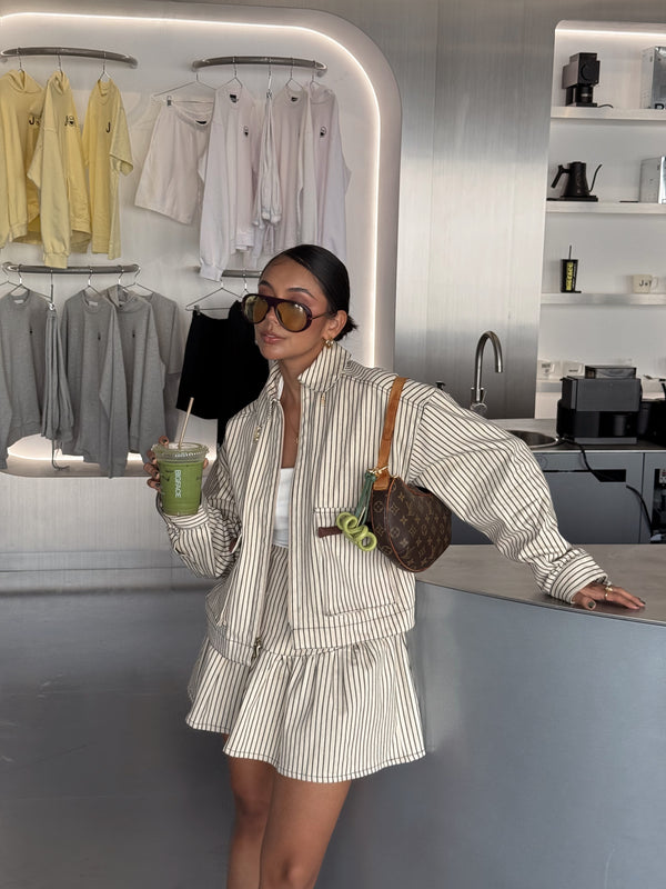 Falda capital beige rayas